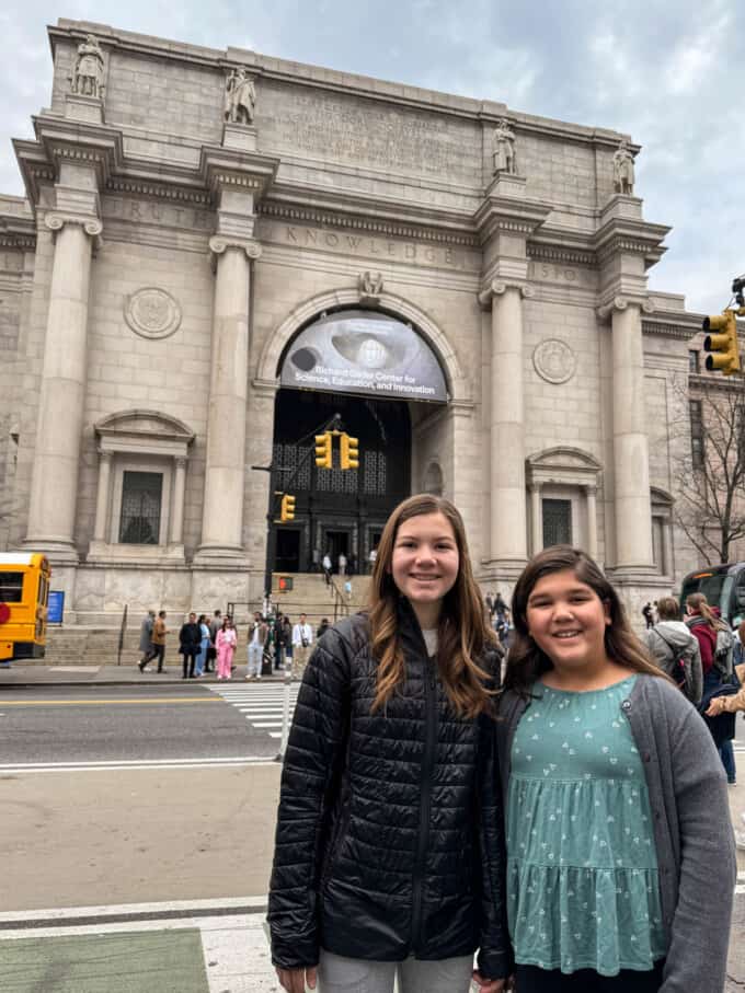 Two girls in front of the Museum of Natural History in New York City.