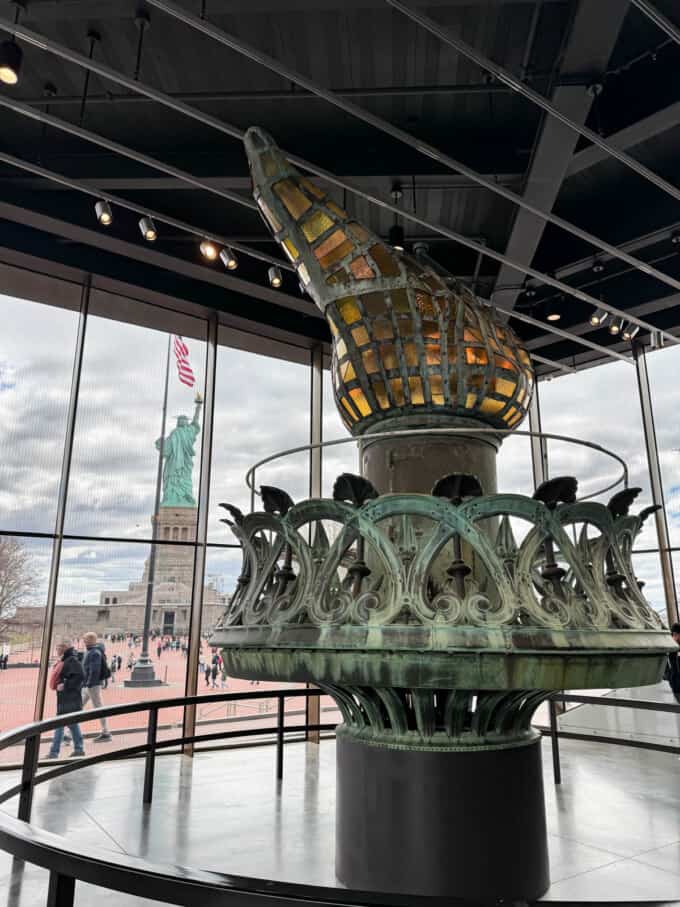 A replica of the torch from the Statue of Liberty inside the Statue of Liberty Museum.