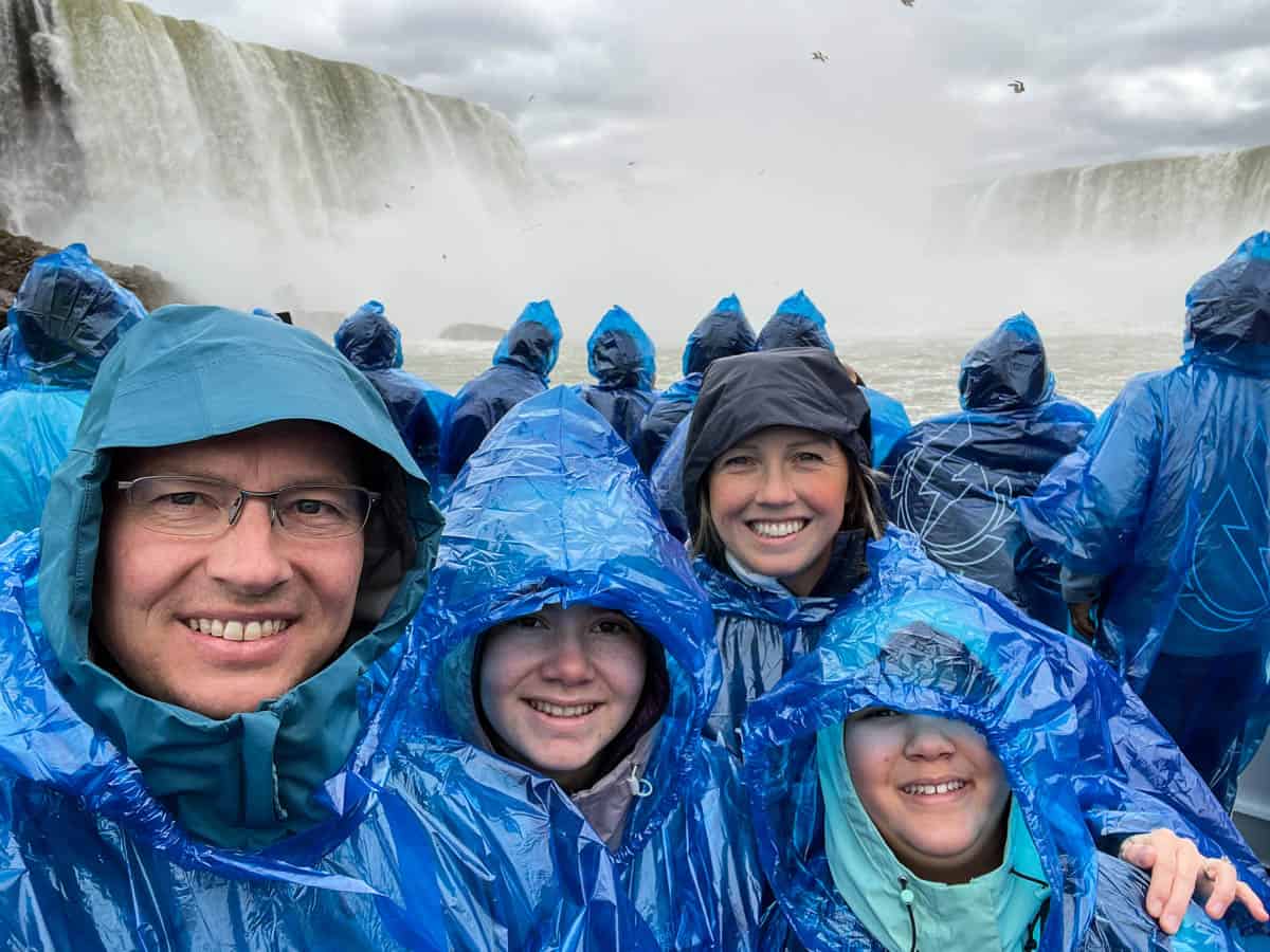 A family of four on the Maid of the Mist at Niagara Falls. 