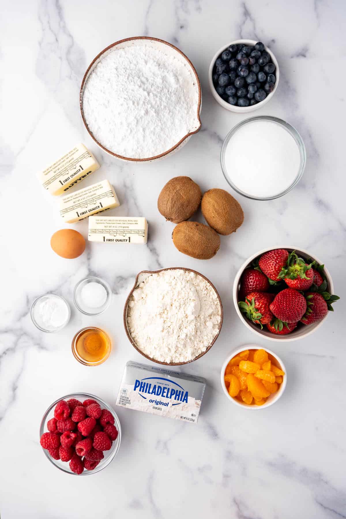 An overhead image of ingredients for making fruit pizza cookies.