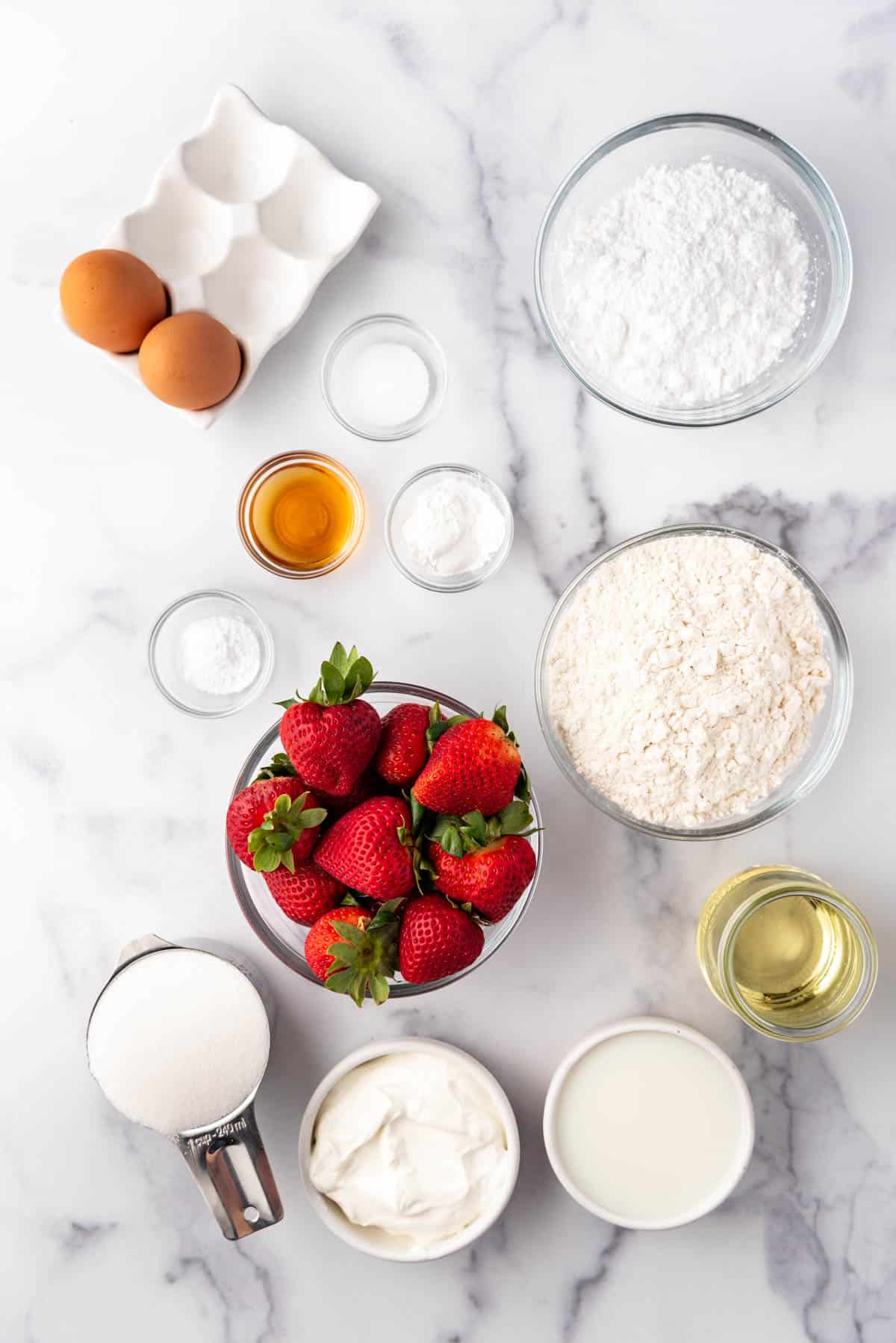 Ingredients for making homemade strawberry bread.