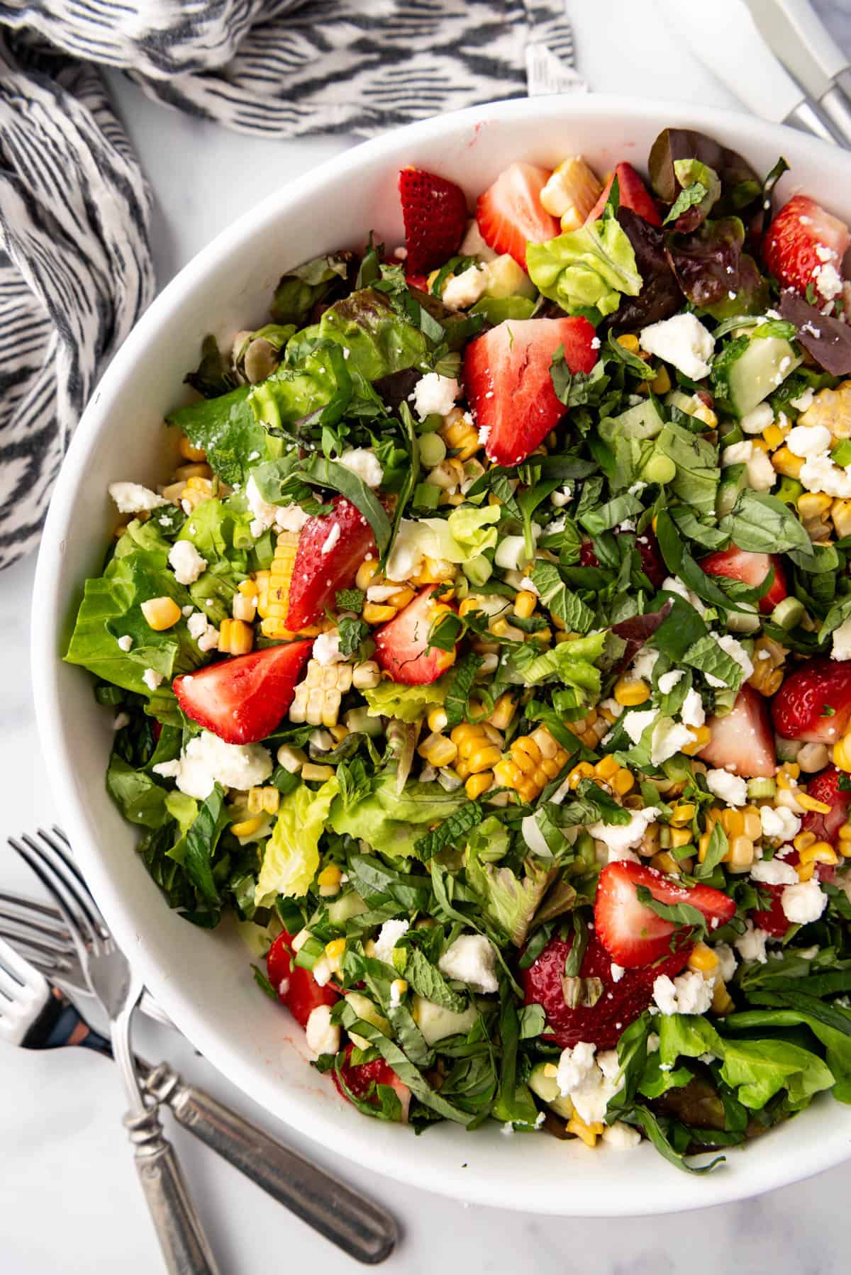 An overhead image of a strawberry corn salad.