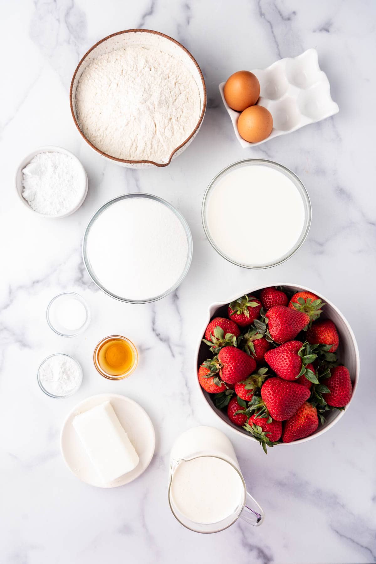 Ingredients for making strawberry shortcake.