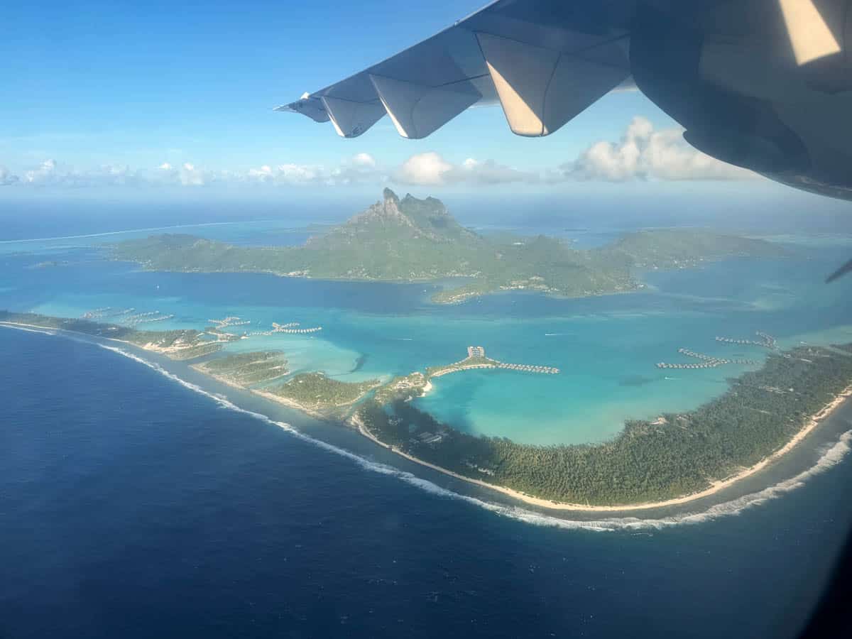 A view of Bora Bora from a plane window.