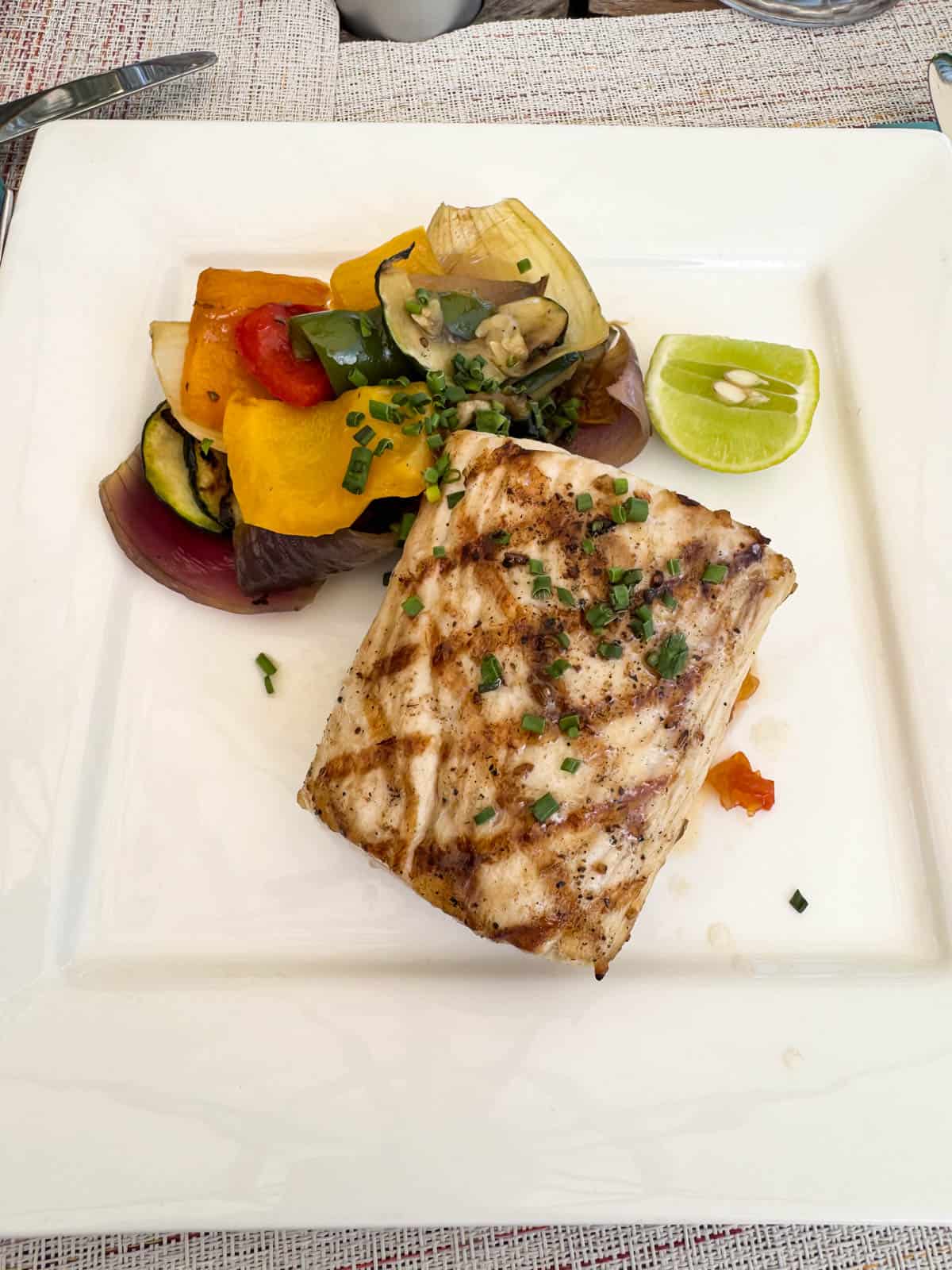 An image of a plate of grilled Mahi Mahi.