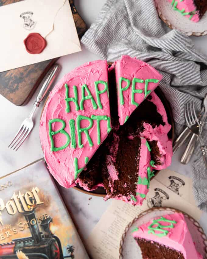 An overhead image of a Harry Potter birthday cake that has been sliced.