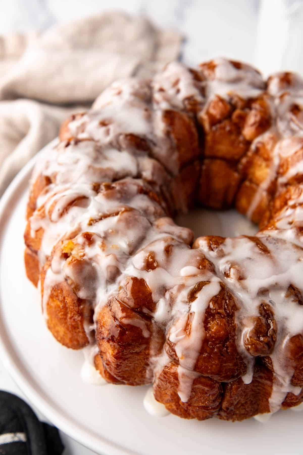 An image of  homemade monkey bread on a white plate.