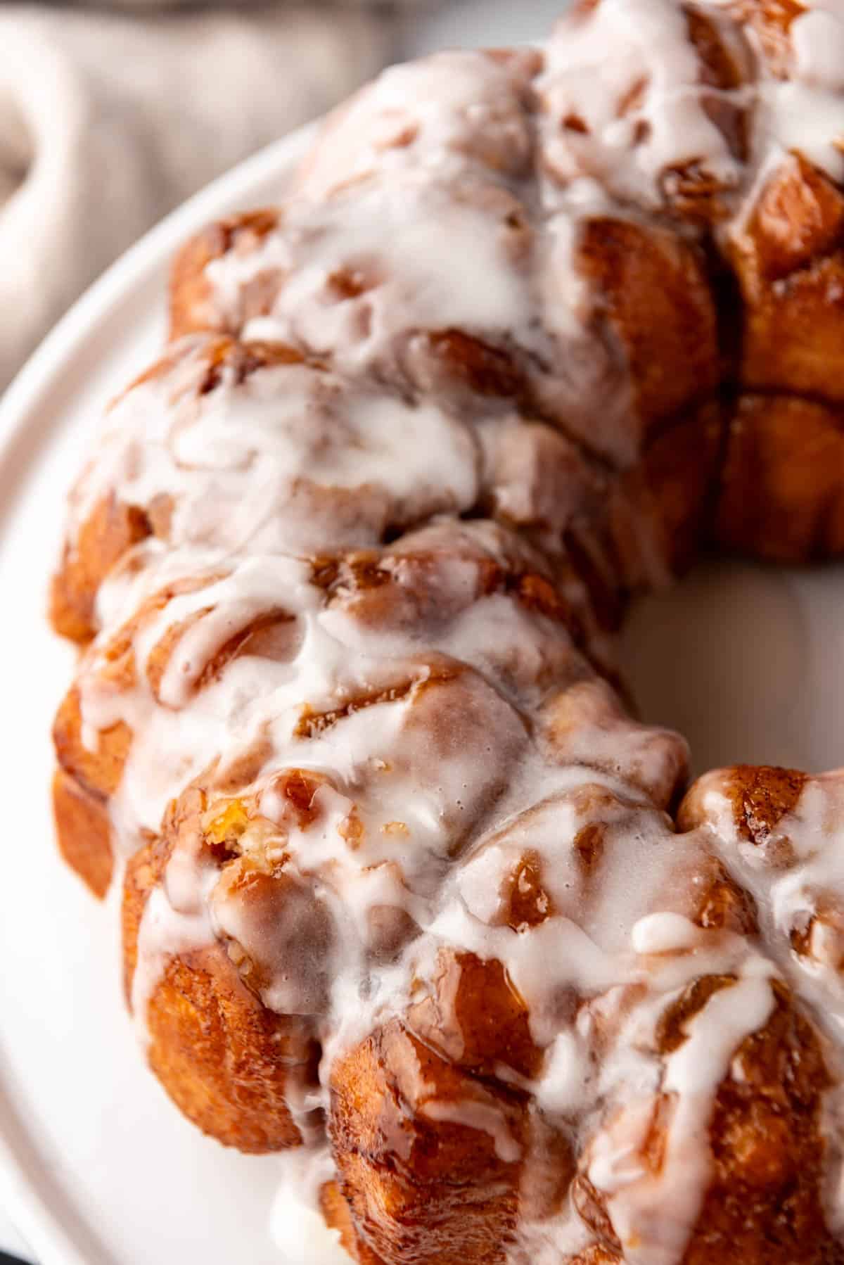 A close image of glaze on top of sticky monkey bread.