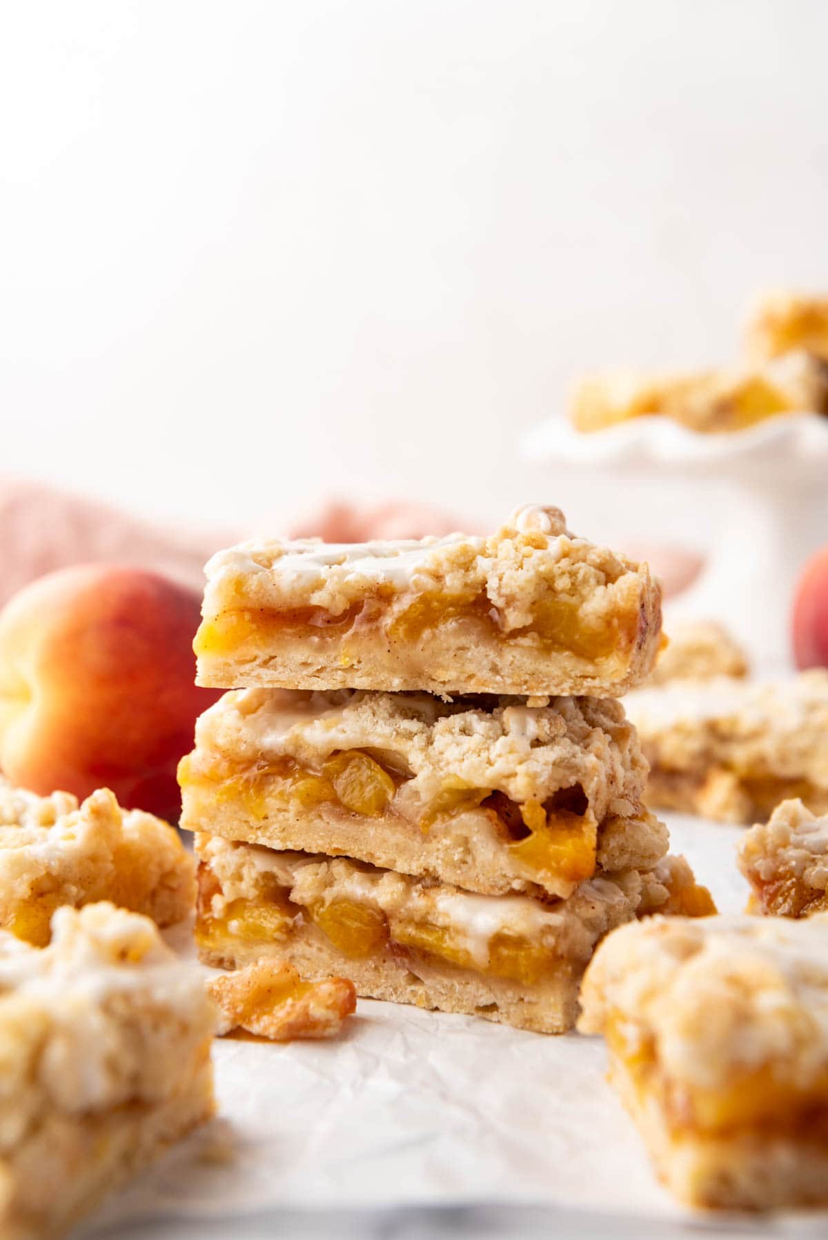 A stack of peach crumb bars.