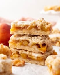 A stack of peach crumb bars.