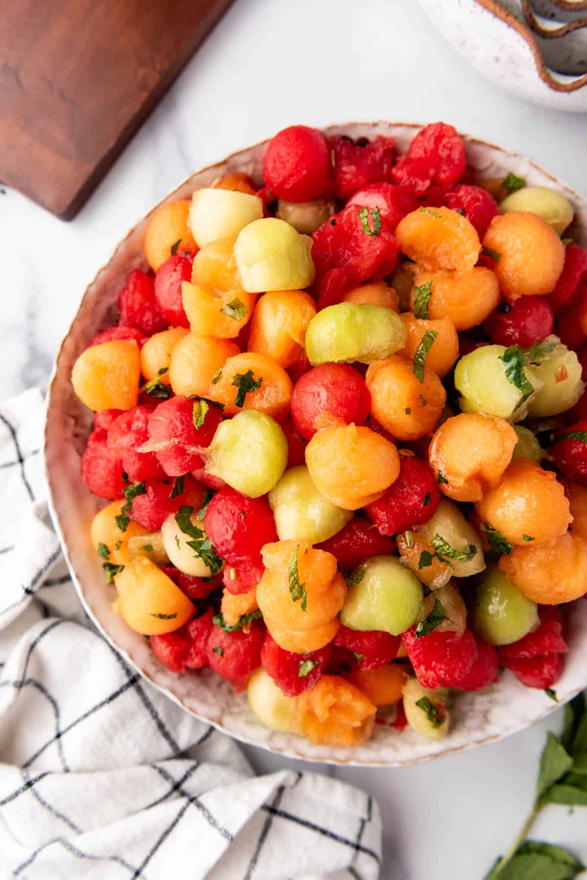 An overhead image of a bowl of fresh melon salad.