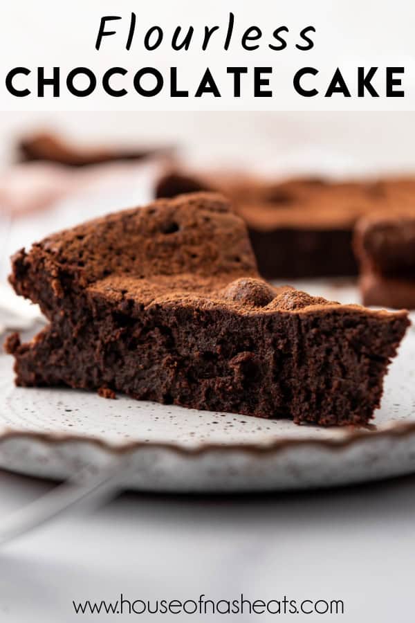 A slice of flourless chocolate cake on a plate with text overlay.