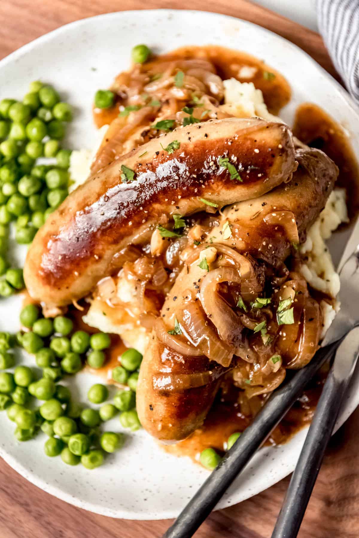 An image of a plate of bangers & mash.