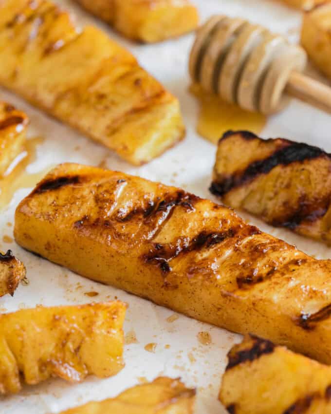 An image of grilled pineapple spears.