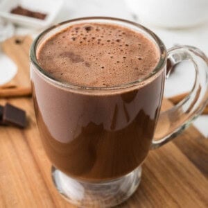 A glass mug of Mexican hot chocolate.