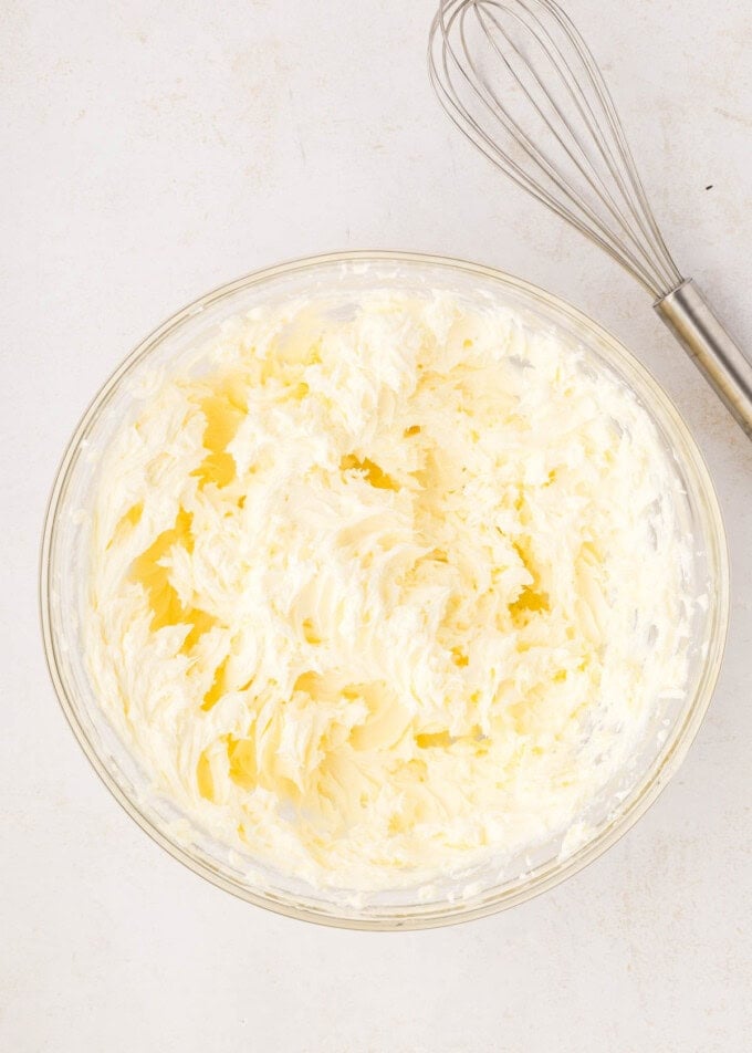 Beaten cream cheese and sugar in a large mixing bowl.