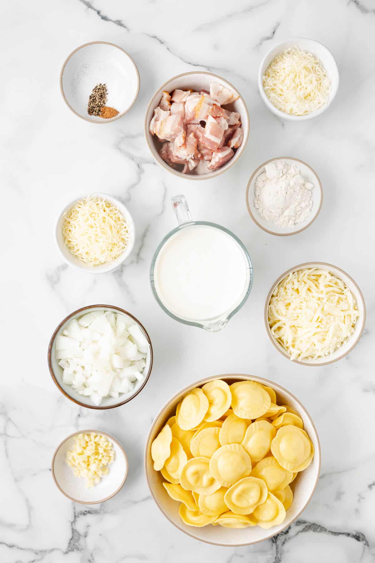 Ingredients for making homemade Olive Garden ravioli carbonara.