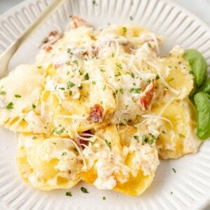 An image of a plate of copycat Olive Garden ravioli carbonara.