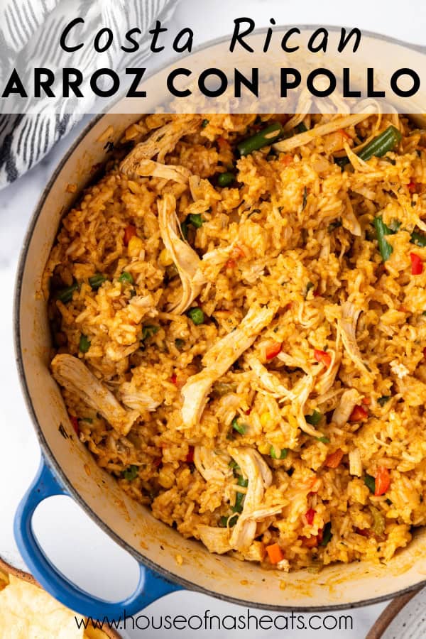 An overhead image of a large pot of arroz con pollo with text overlay.