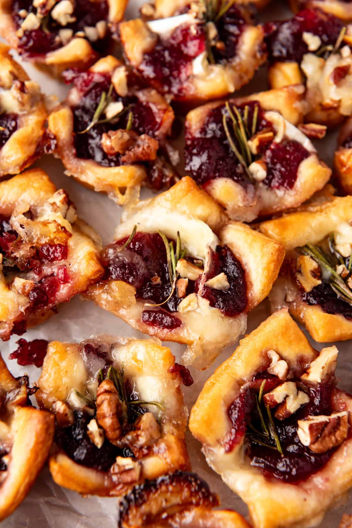 A close image of cranberry brie bites made with crescent roll dough.