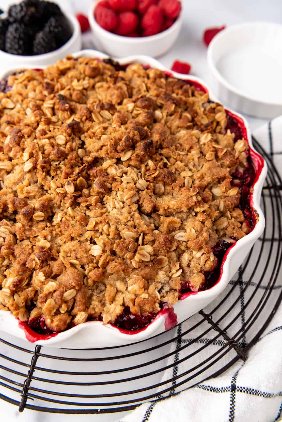 An oat crisp topping on a mixed berry crisp.