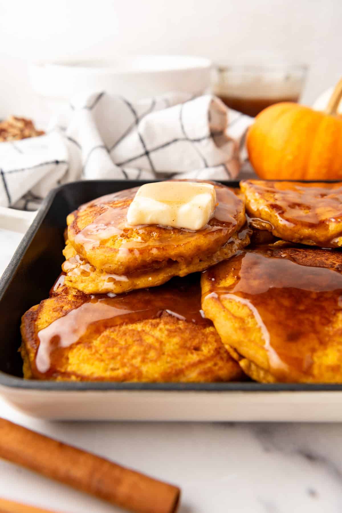 An image of pumpkin pancakes on a serving platter.