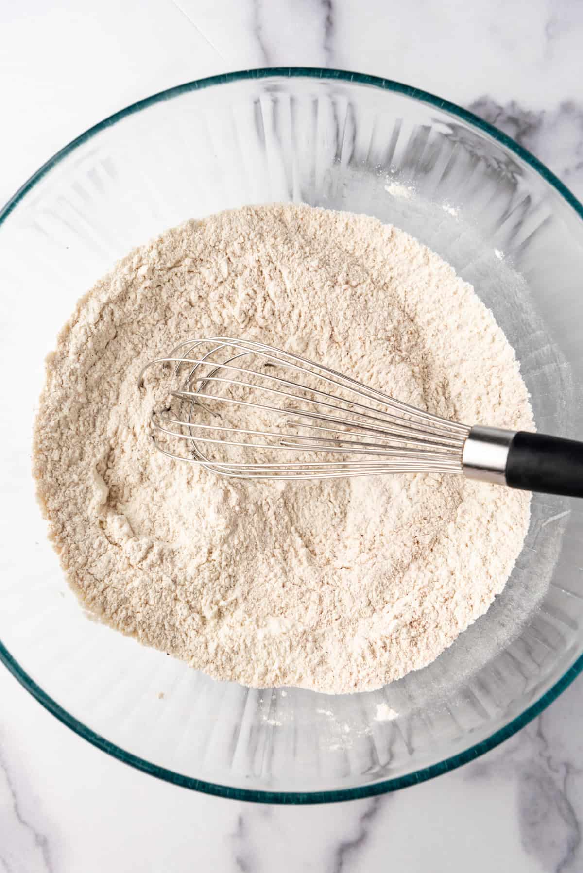 Whisked dry ingredients in a bowl.