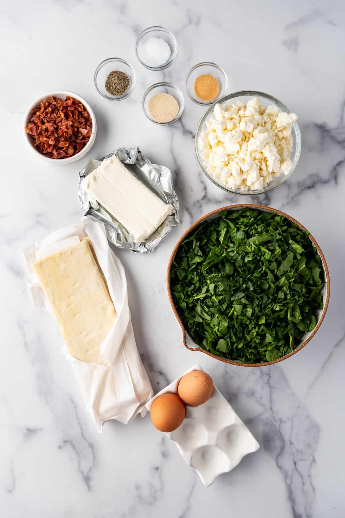 Ingredients for making spinach puffs.