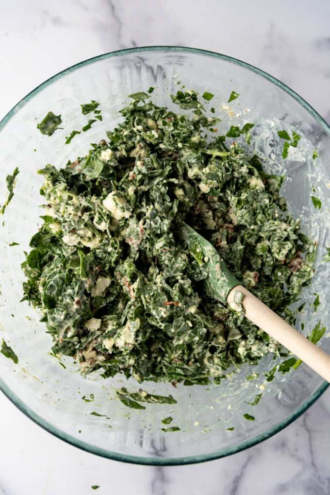 Spinach puff filling in a large mixing bowl.