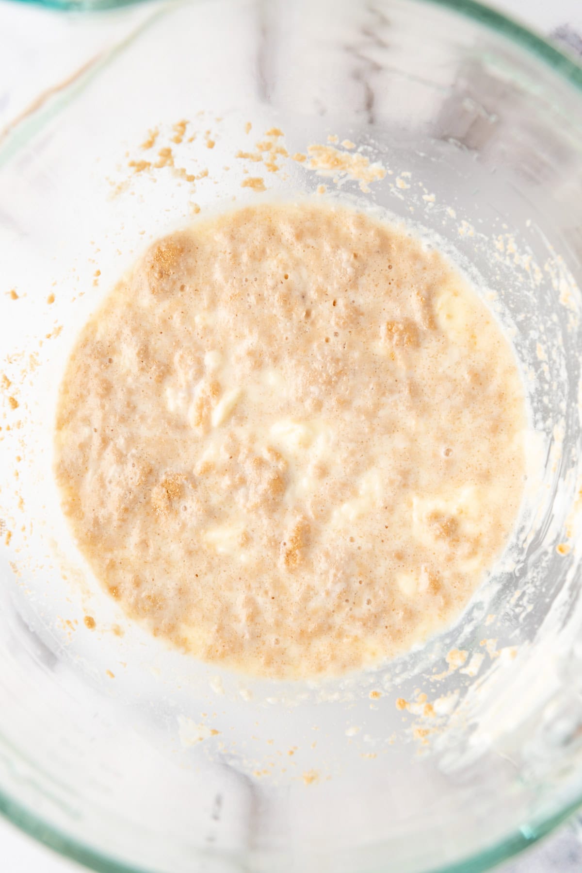 Foamy yeast in a bowl.