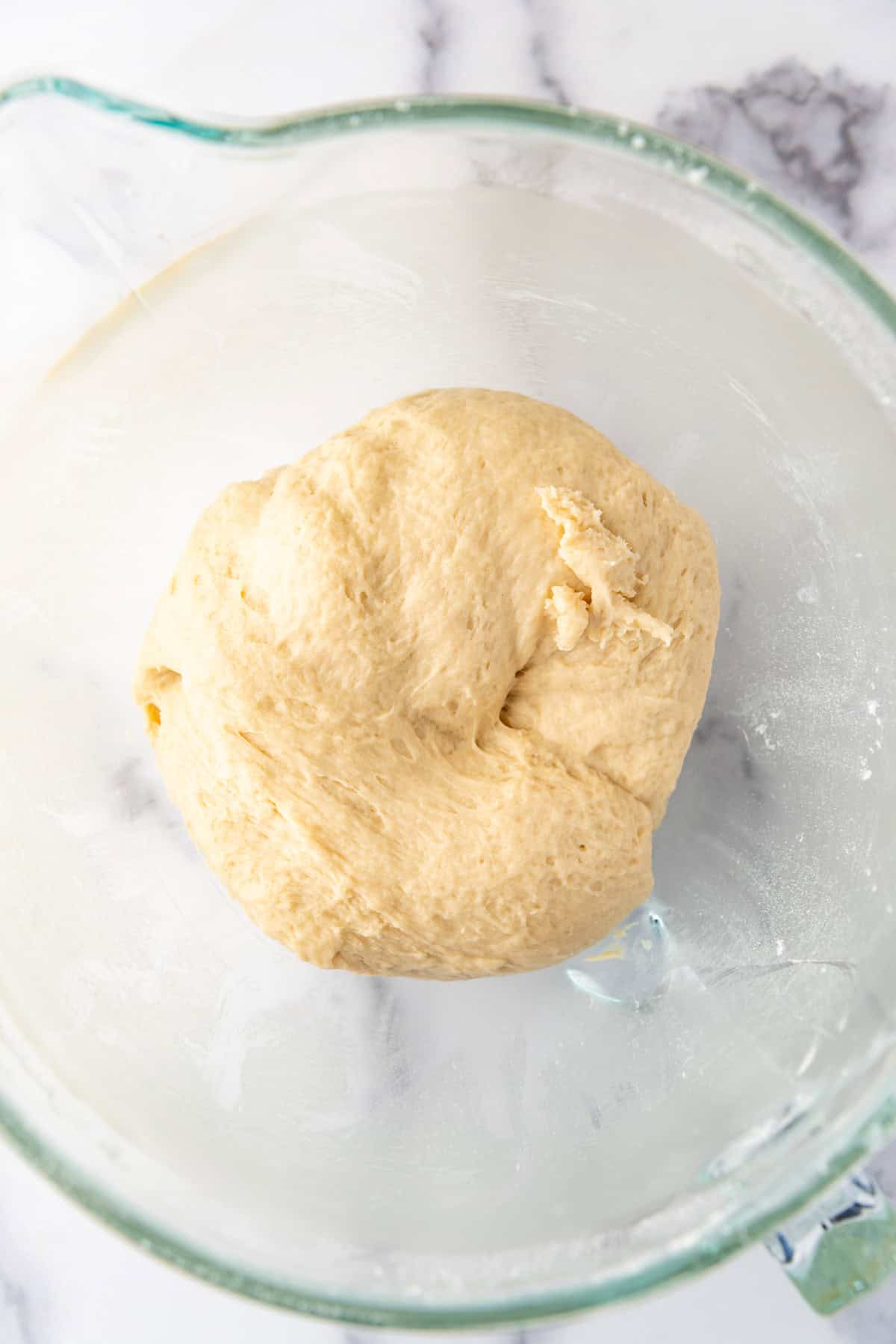 Kneaded dough in a bowl.