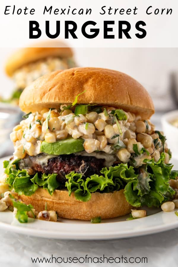 An elote burger with mexican street corn topping and text overlay.