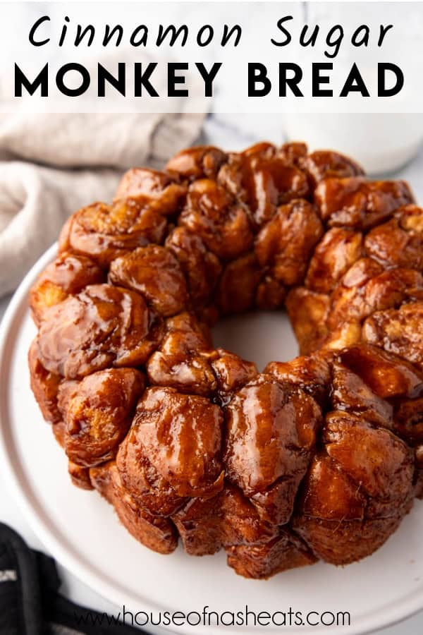 Homemade monkey bread on a white plate with text overlay.