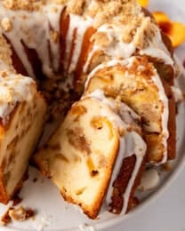 A close image of a sliced peach cobbler pound cake.