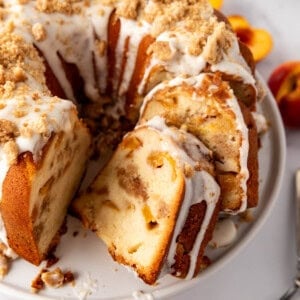 A close image of a sliced peach cobbler pound cake.