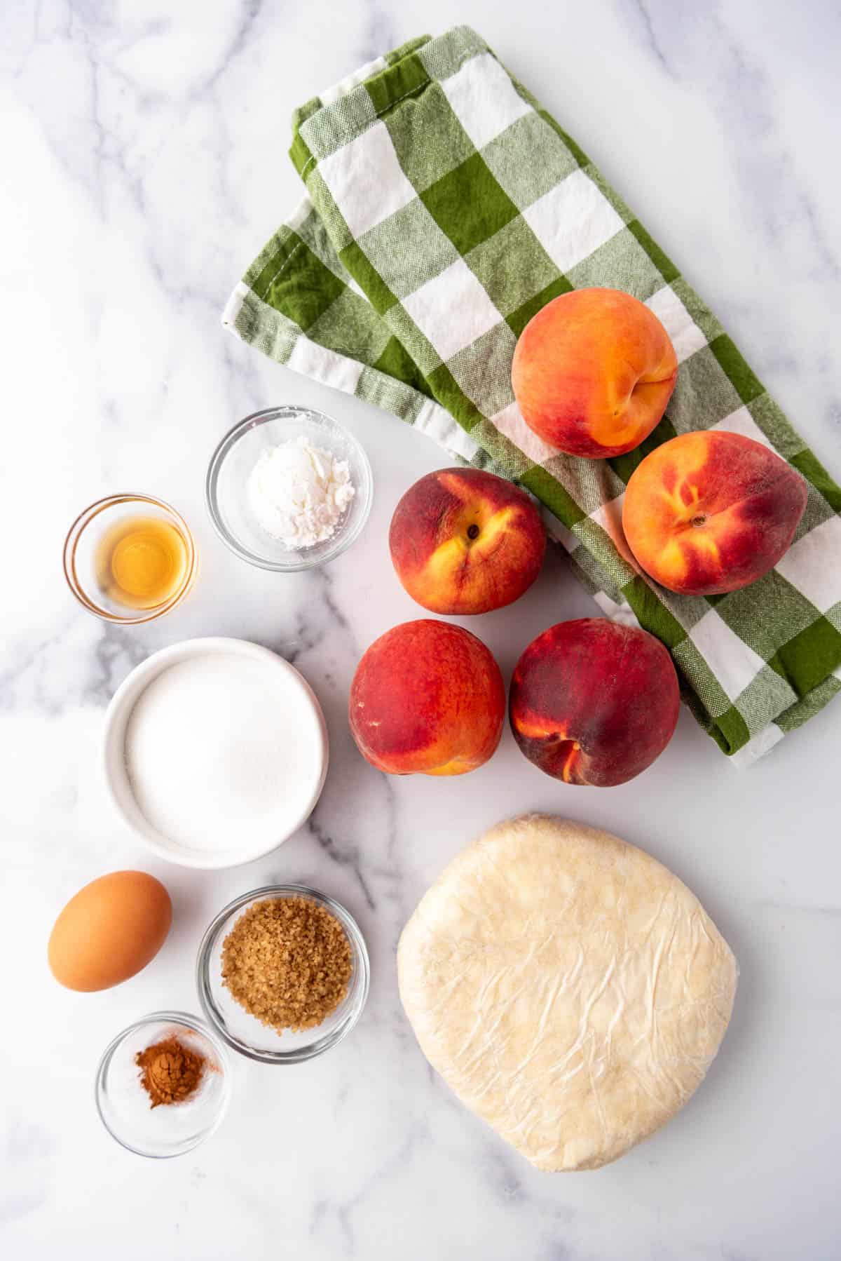 Ingredients for making a peach galette.