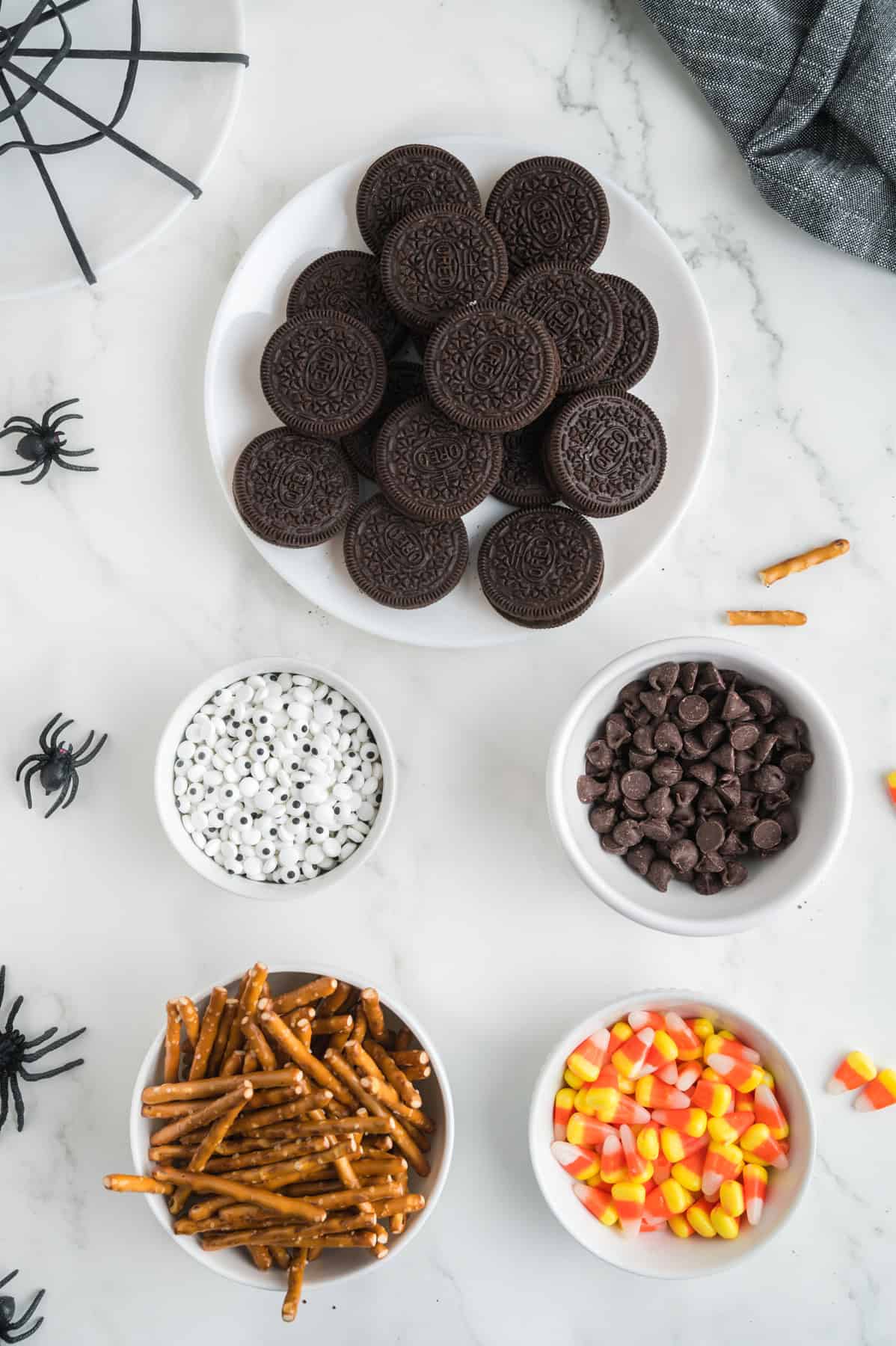 Overhead shot of ingredients needed for Halloween Oreo Spiders.