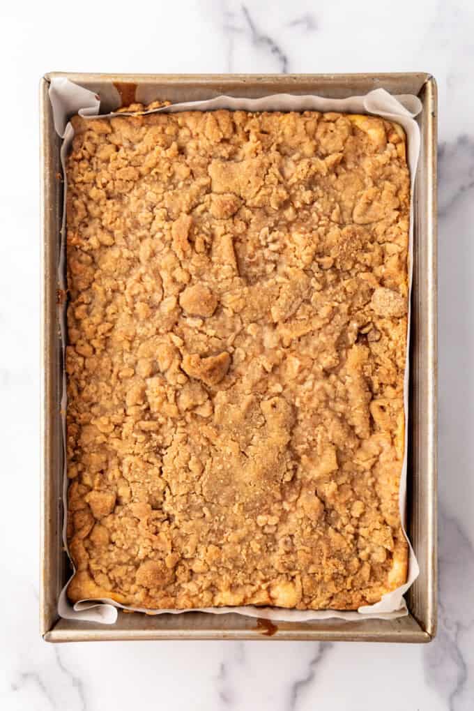 Overhead view of baked Caramel Apple Cheesecake Bars in the pan.