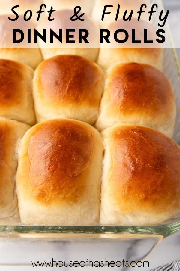 Golden brown dinner rolls in a glass baking dish with text overlay.