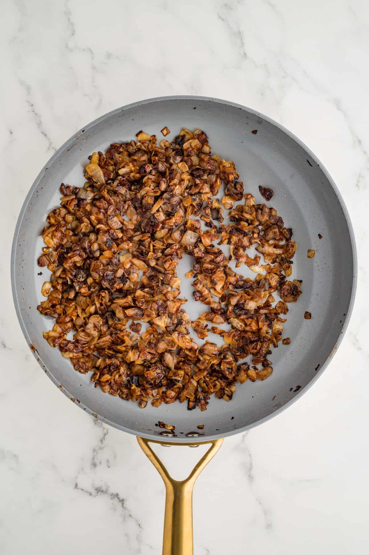 Caramelized onions in a skillet.