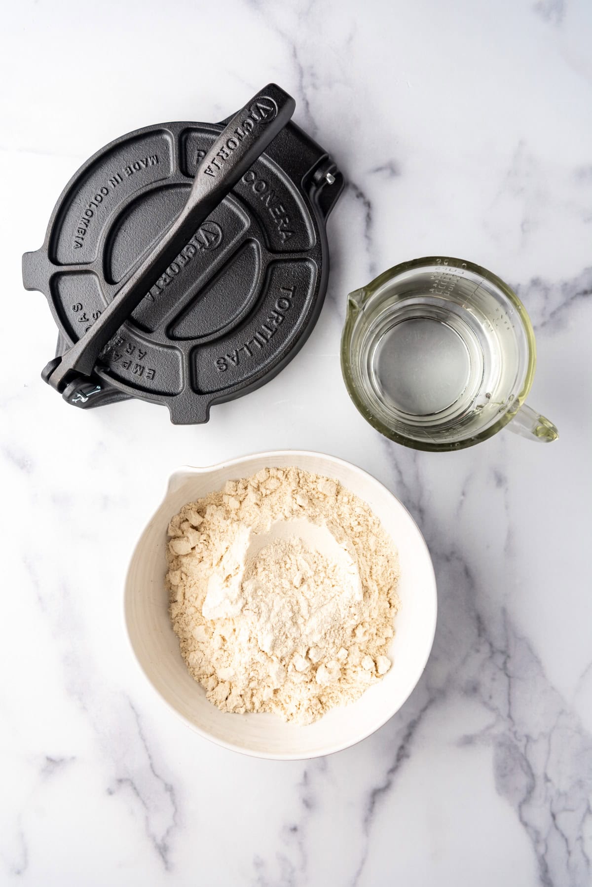 Ingredients for making homemade corn tortillas.