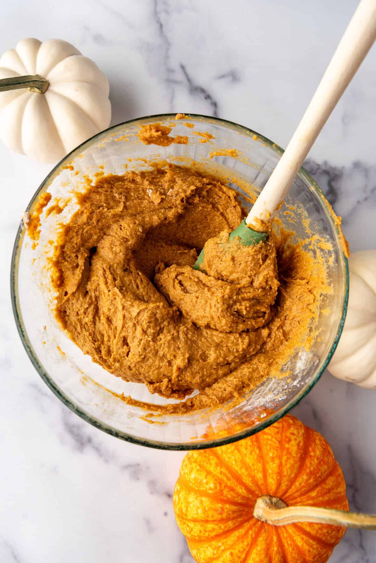 Pumpkin muffin batter in a bowl.