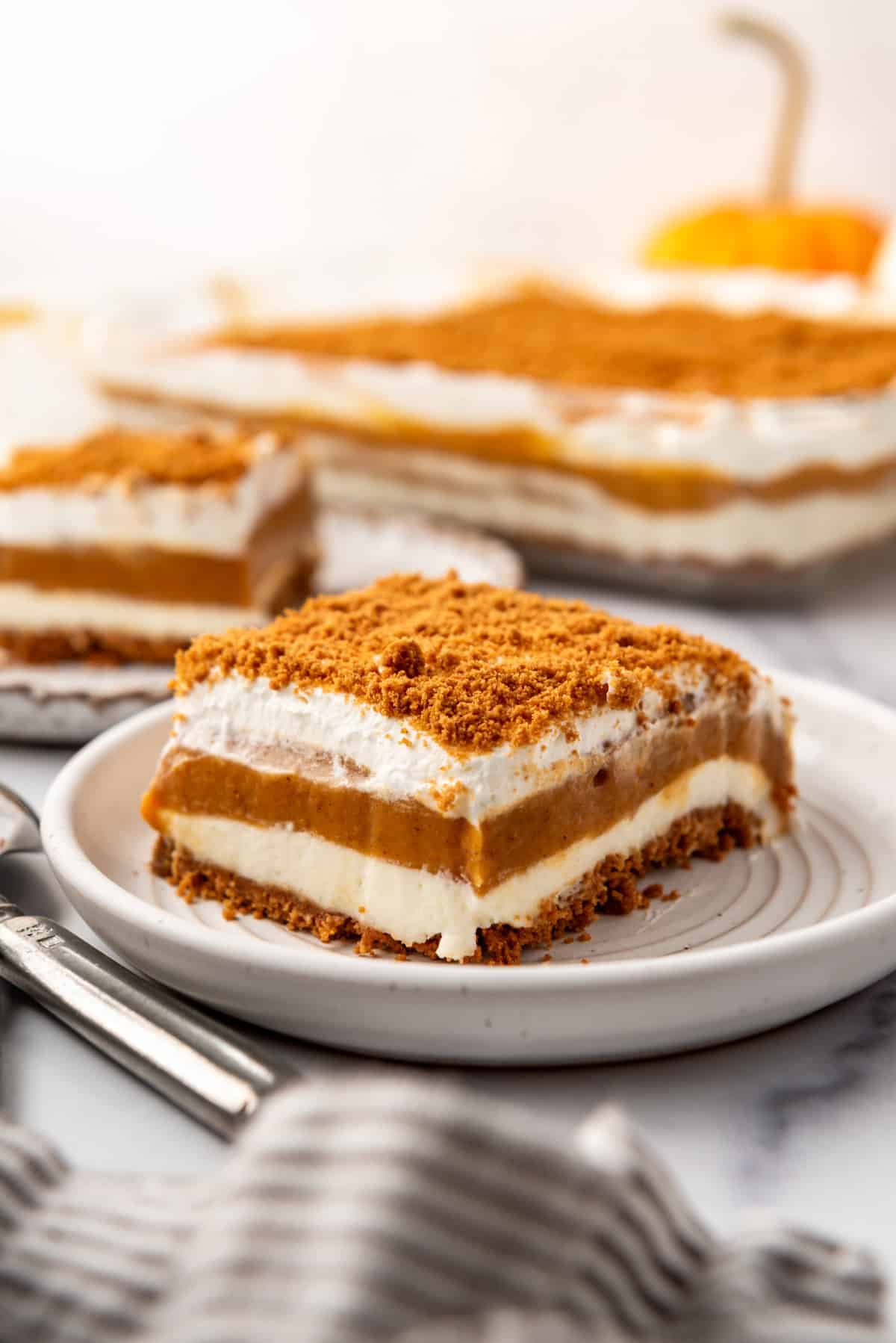 Slices of layered pumpkin lush on plates.