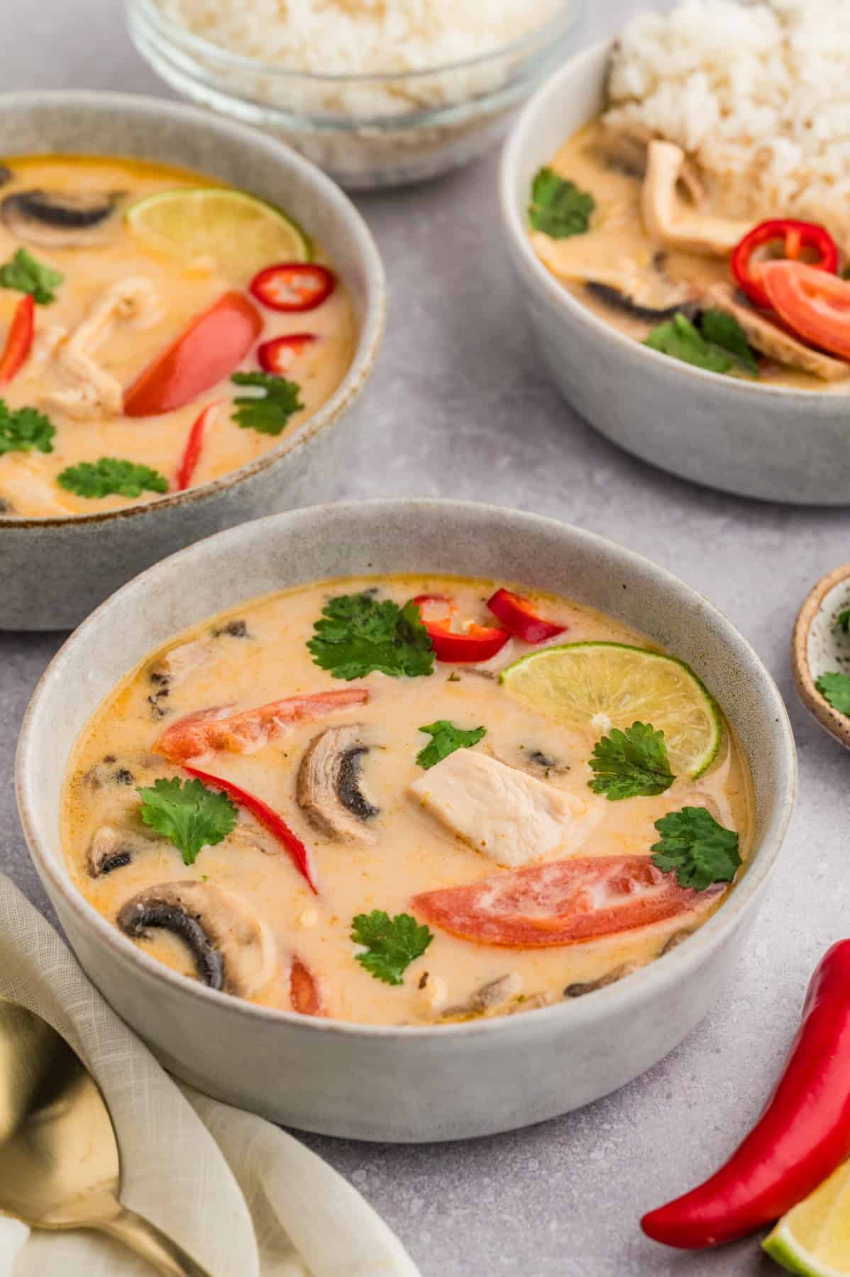 Bowls of tom kha gai soup.