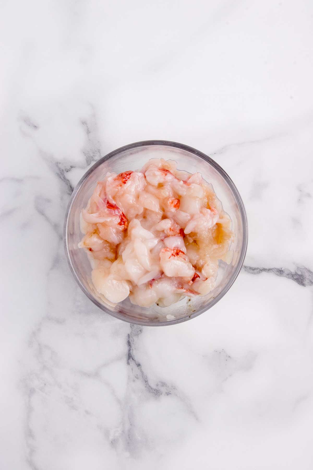 Chopped lobster in a bowl.