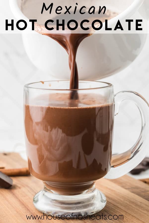 Mexican hot chocolate being poured into a glass mug with text overlay.