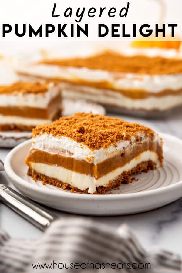 A slice of pumpkin lasagna with text overlay.