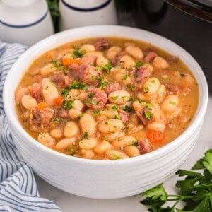 An image of a bowl of ham and bean soup.