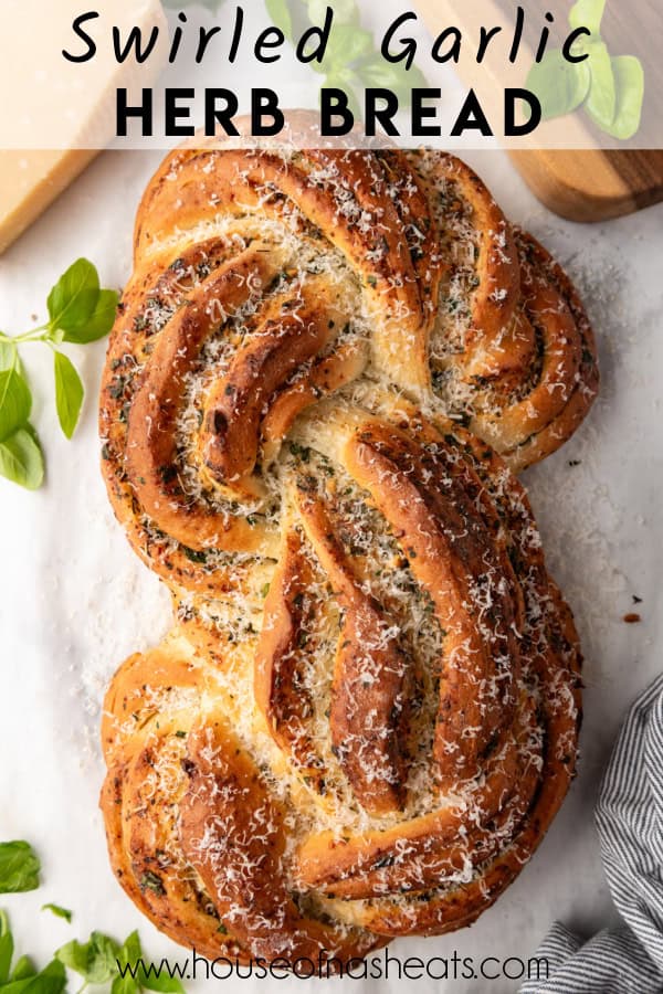 An overhead image of a loaf of swirled garlic herb bread.