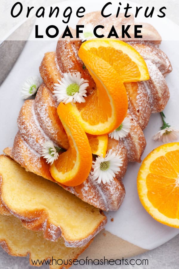 An overhead image of a partially sliced orange loaf with text overlay.